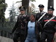 Azziz Amrani mentre viene portato in tribunale dai Carabinieri