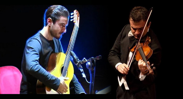 Diego Campagna con la chitarra e Fation Hoxholli col violino Diego Campagna con la chitarra e Fation Hoxholli col violino