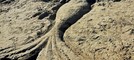 Arte in spiaggia ad Arma di Taggia: un giovane artista scolpisce Nettuno nella sabbia davanti al Ruffini (Foto)