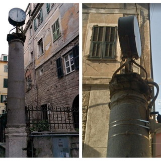 Ventimiglia: 'liberata' dopo tanti anni la colonna che sostiene l'unico orologio del centro storico (Foto)