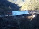 Il ponte di Rocchetta con lo striscione apposto dalla Provincia.
