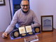 Il direttore artistico Fiorenzo Runco con i riconoscimenti ottenuti dalla rassegna Il direttore artistico Fiorenzo Runco con i riconoscimenti ottenuti dalla rassegna