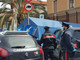 Un momento della conduzione in carcere degli imputati Un momento della conduzione in carcere degli imputati