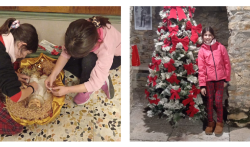 Seborga, due bambine riparano le dita della statuina di Gesù Bambino (Foto)