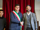 A sinistra Davide Ballerini e davanti Eugenio Bianchi mentre stringe la mano a Mario Conio A sinistra Davide Ballerini e davanti Eugenio Bianchi mentre stringe la mano a Mario Conio