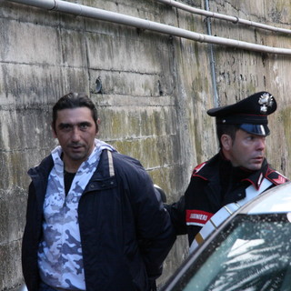 Nelle foto Giorgio Locatelli mentre viene portato in Tribunale.