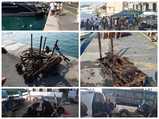 Imperia: pulizia dei fondali del porto di Oneglia, tra i rifiuti una biciletta e un passeggino (foto e video)