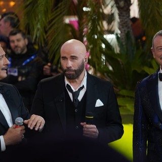 Polemica John Travolta a Sanremo 2024, Amadeus: "Nessun tranello, sapeva tutto"