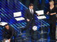 Francesco Totti sul palco dell'Ariston con Carlo Conti e Maria De Filippi